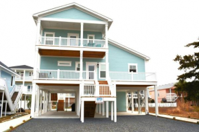Coastal Chaos 303 Sand Piper Ln, home